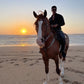 Balade à cheval d'une heure au coucher du soleil en bord de mer