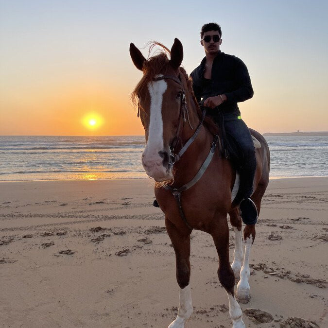 Balade à cheval d'une heure au coucher du soleil en bord de mer
